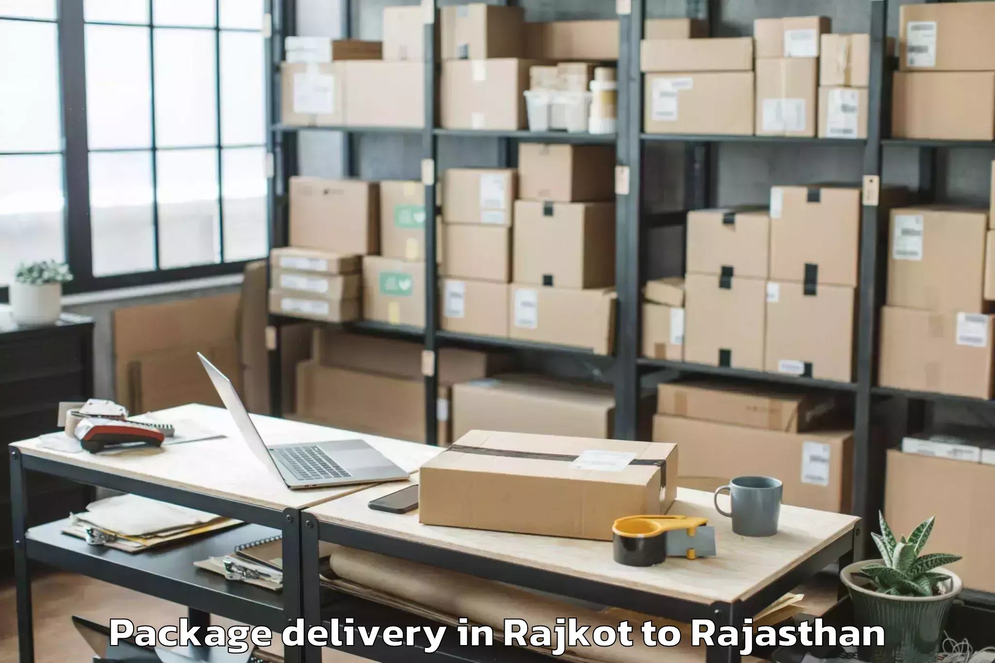 Easy Rajkot to Jagannath University Jaipur Package Delivery Booking